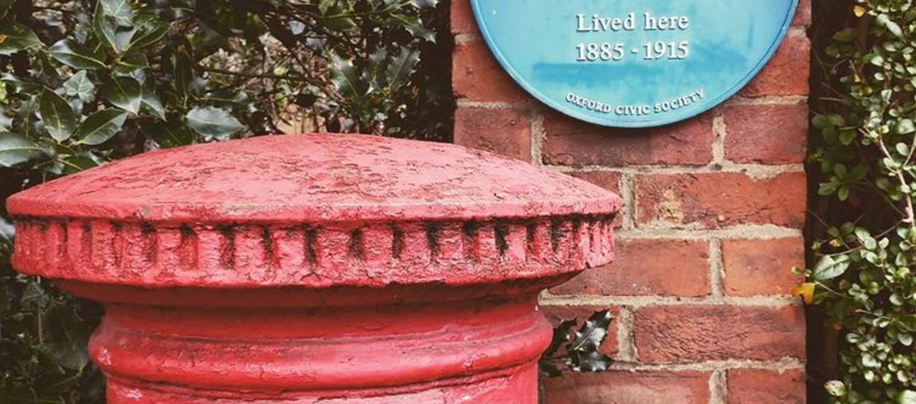 Letter box outside Murray's home with blue plaque