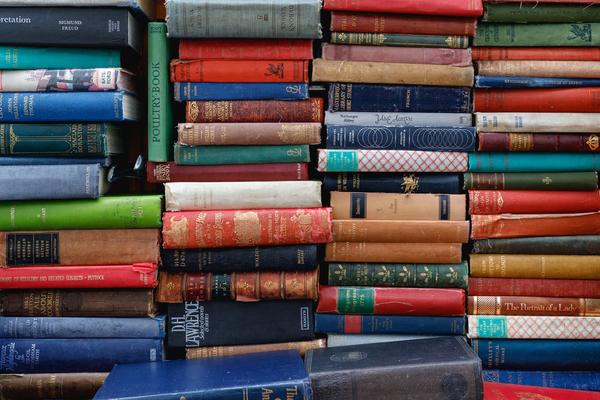 books piled up with spines visible