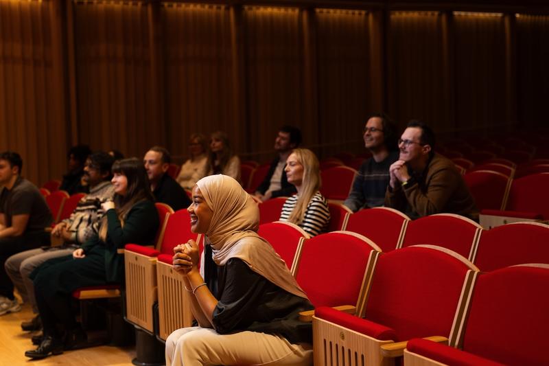 People sat in lecture theatre enthralled