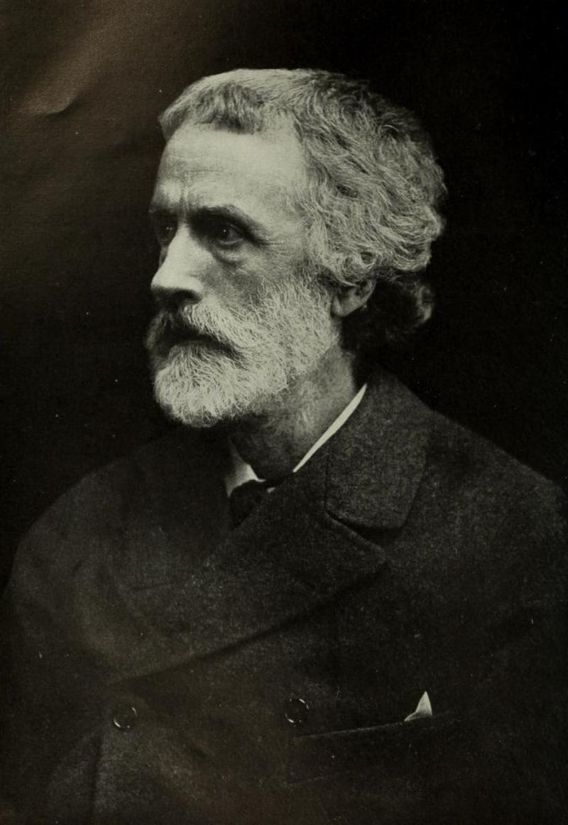A black and white photographic portrait of George Meredith