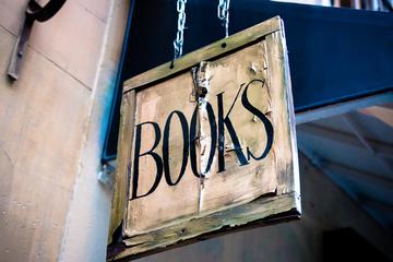 Tattered book shop sign 