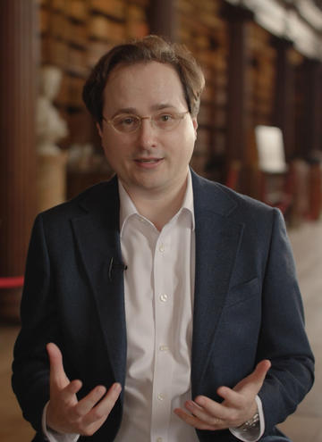 Michael Sullivan talking to camera