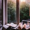 large window with books on window sill